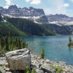 Beautiful Alpine Lake surrounded by mountains and trees