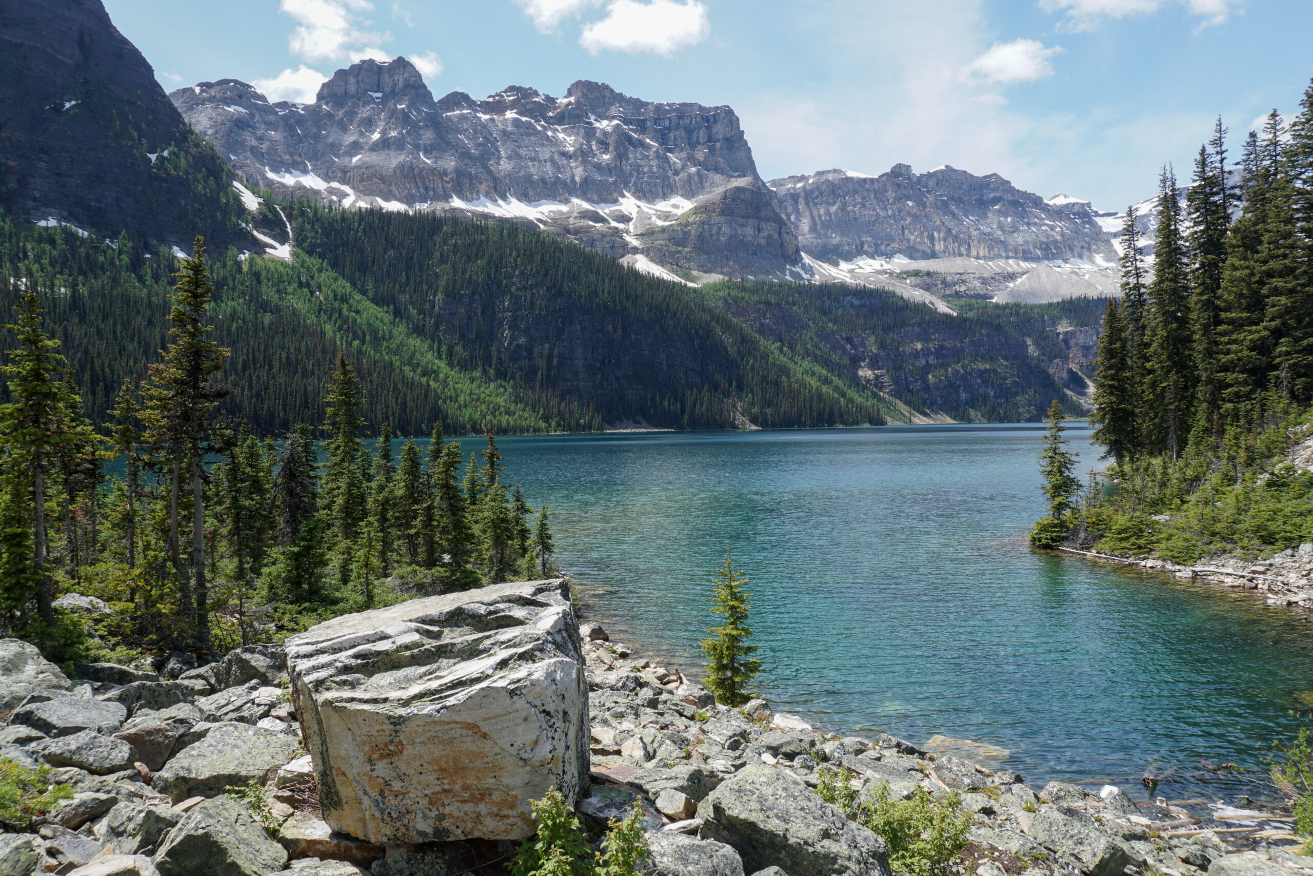 Beautiful Alpine Lake surrounded by mountains and trees