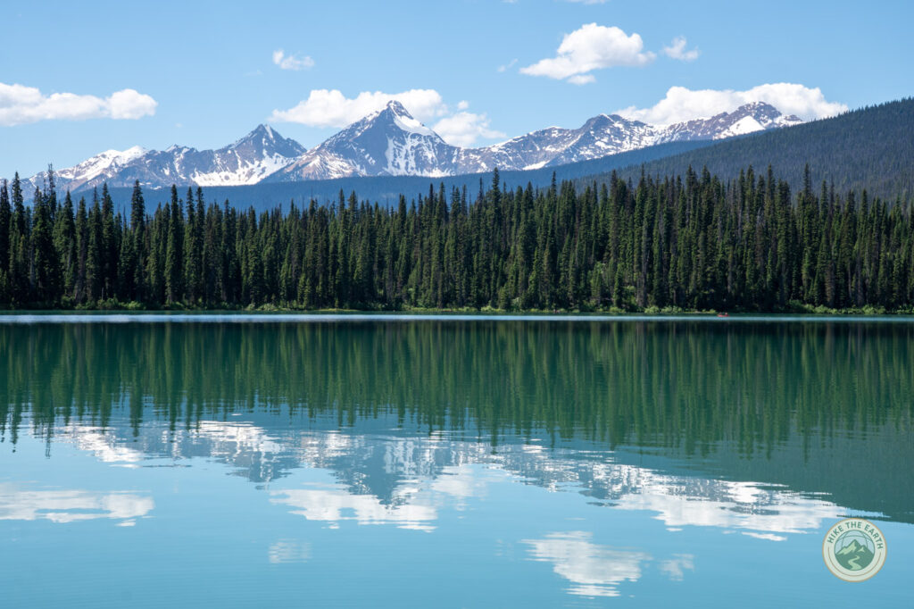 Mountain reflections on Emerald Lake from the back of the lakeshore trail