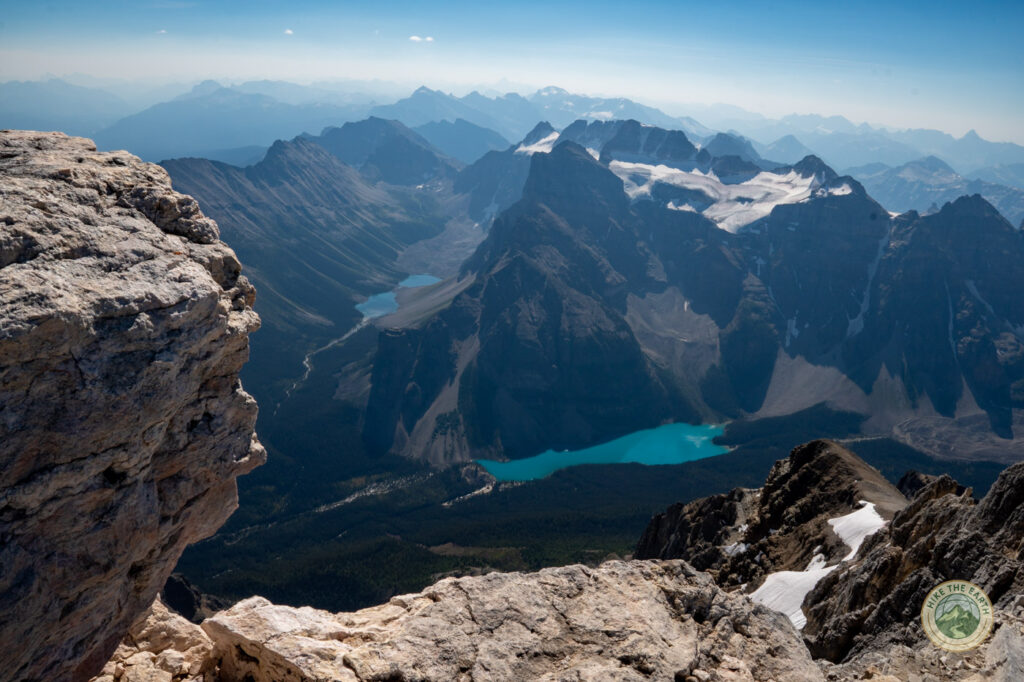 Aerial view of Moraine Lake from the Mount Temple summit near the exposed edge